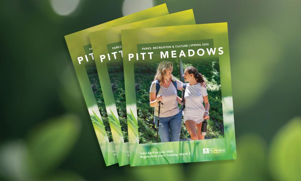 cover of program guide with image of woman and youth walking on trail